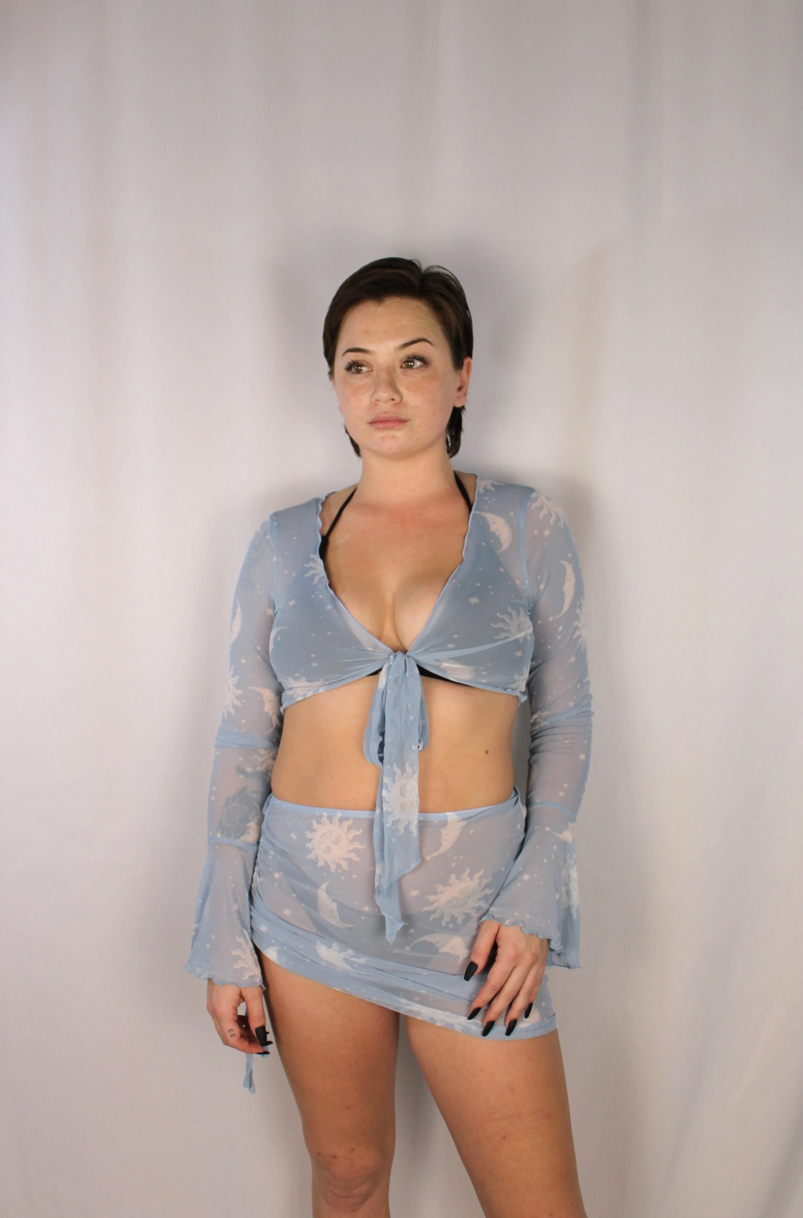 BELL SLEEVE CROP TOP AND MINI SKIRT SUN & MOON PRINT MESH SET WITH TIE AND SIDE RUCHING DETAIL