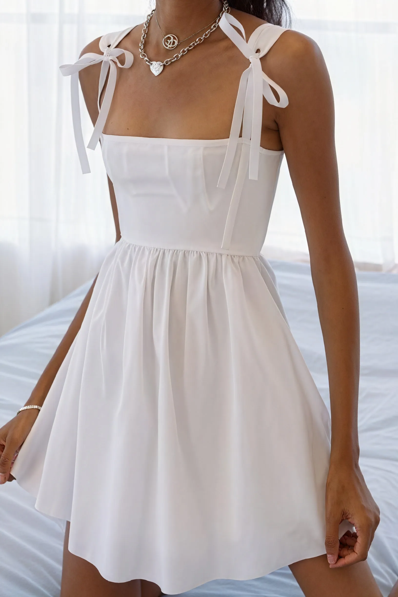 Bow Shoulder Mini Dress - Chic & Modern