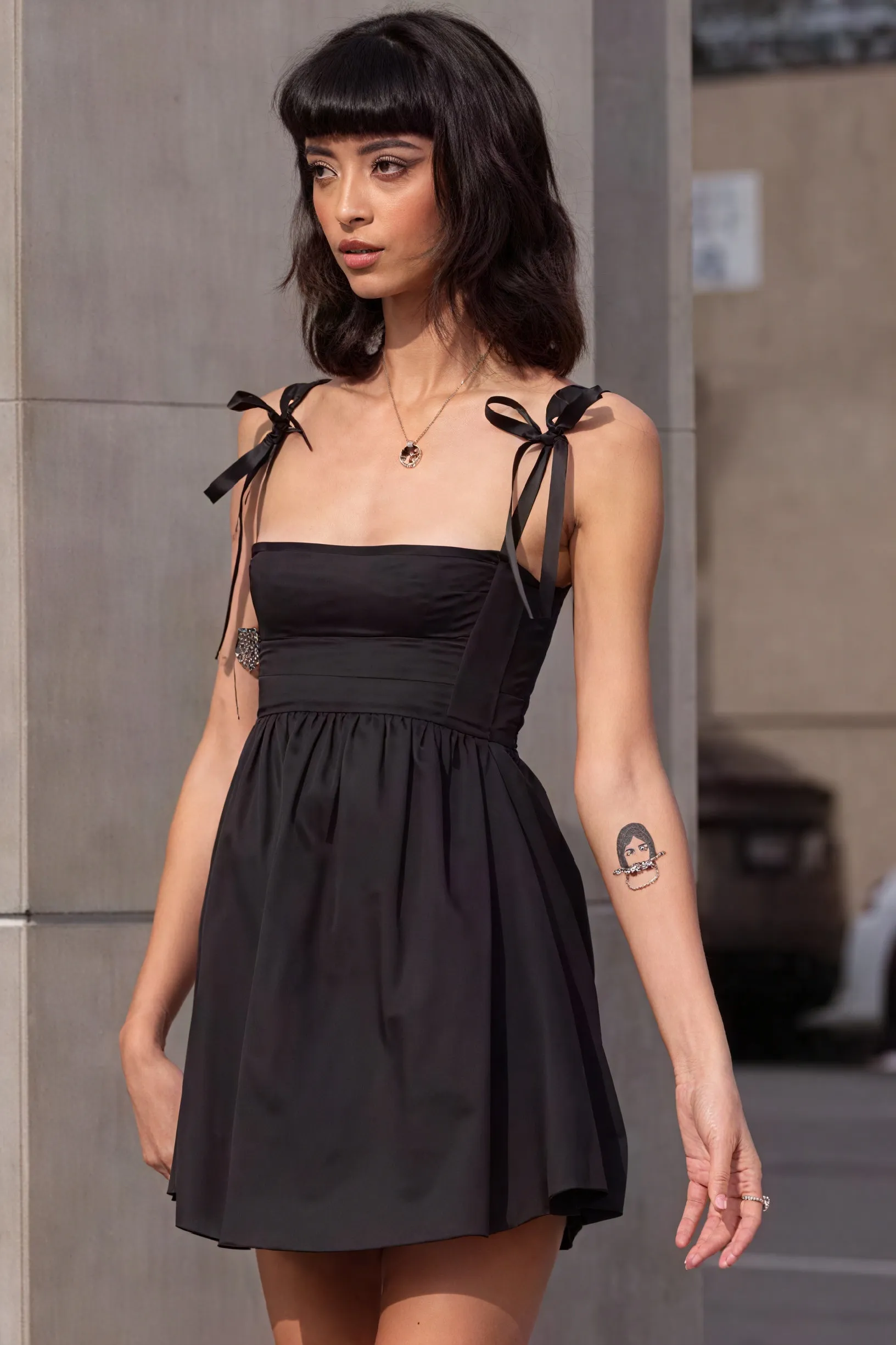 Bow Shoulder Mini Dress - Chic & Modern