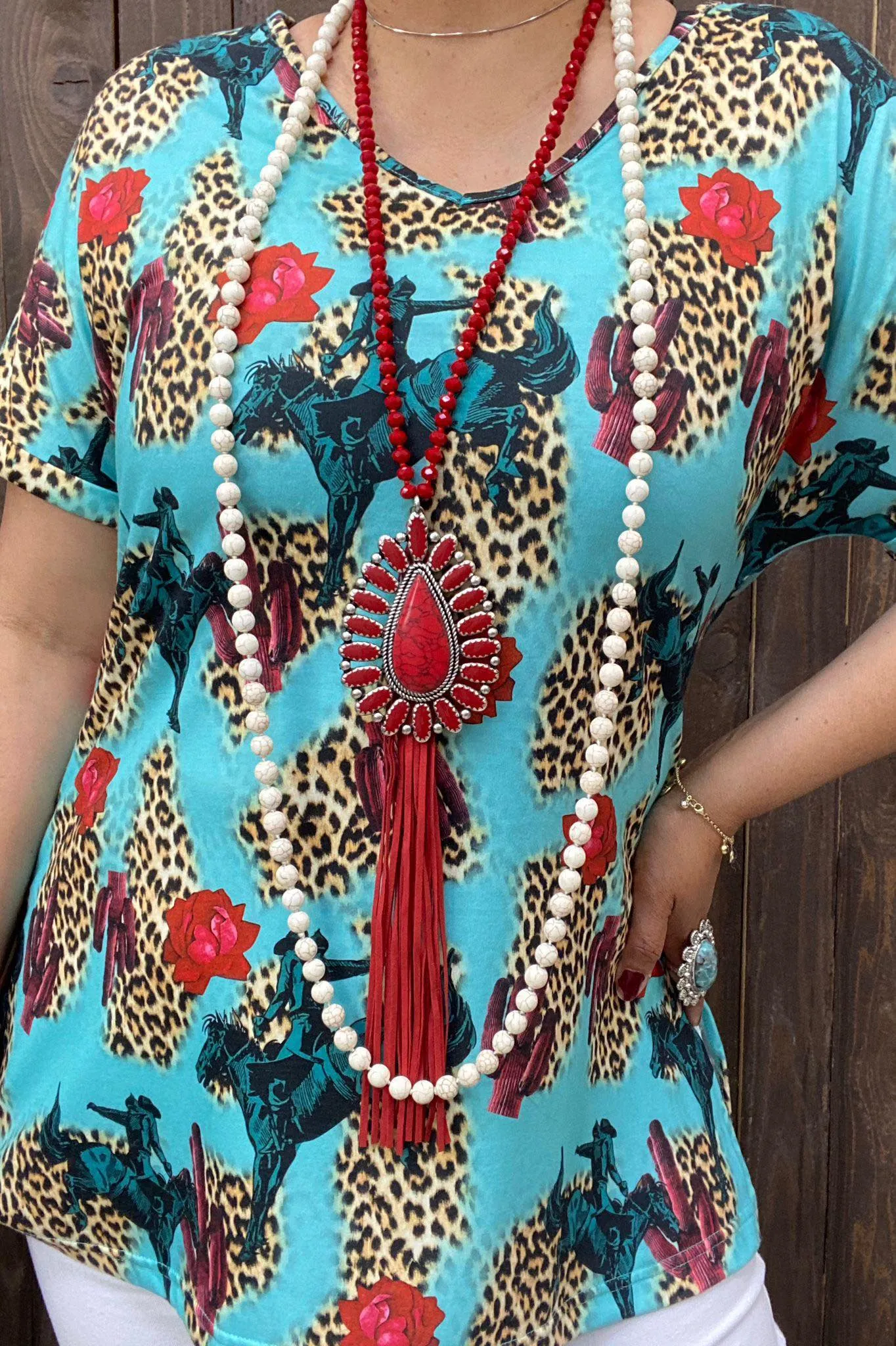 Turquoise Top with Bronc rider, Cactus, & Leopard print